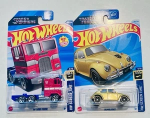 TRASFORMATORI HOT WHEEL OPTIMUS PRIME E GOLD BUMBLEBEE - Foto 1 di 1