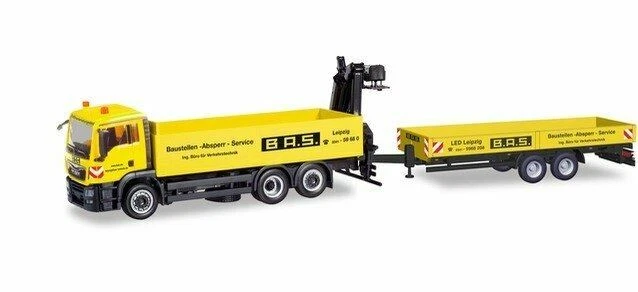 Camión HO 1:87 Herpa # 310840 - MAN TGX con remolque y polipasto - amarillo B.A.S. Foto 1 de 1