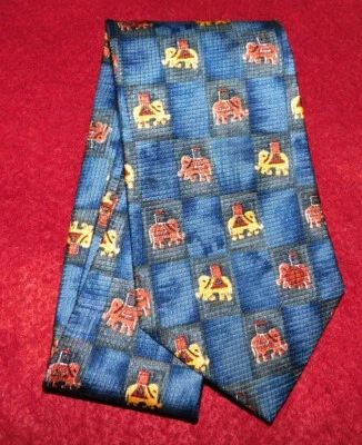 CORBATA DUNHILL HECHA EN ITALIA AZUL/AMARILLO/ROJO MOTIVO ELEFANTE - CORBATAS DE DISEÑADOR. Foto 1 de 3