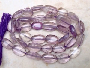 Cuentas de piedras preciosas ovaladas de amatista de 10-8 mm de largo x 7-6 mm de ancho hebra de 14" - Imagen 1 de 2