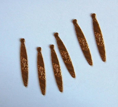 6 CUENTAS COLGANTES ESTAMPADAS LATÓN CRUDO CUENTAS LARGAS PLANAS FORMA OVALADA Foto 1 de 2