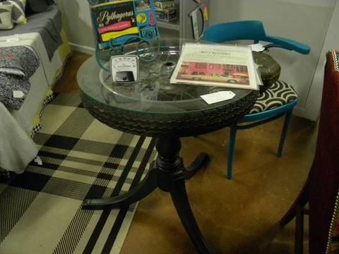Vintage tri-leg table with motorcycle tire top and glass black Cover