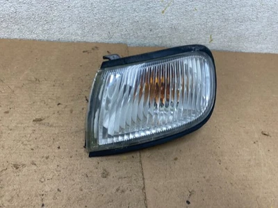Nissan Máxima 1997-1999 conductor izquierdo esquina izquierda intermitente OEM P6606 DW Foto 1 de 4