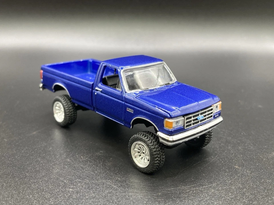 Camión Ford F-250 1991 elevado 4x4 1/64 diecast personalizado Greenlight camioneta todo terreno Foto 1 de 4