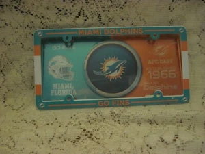 MIAMI DOLPHINS METAL LICENSE PLATE AND PLASTIC FRAME TWO TONE 6" X 12" NEW NFL - Picture 1 of 2