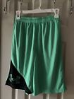 UNDER ARMOUR YOUTH SZ LARGE GREEN/BLACK ATHLETIC WEAR SHORTS 10.5” INSEAM