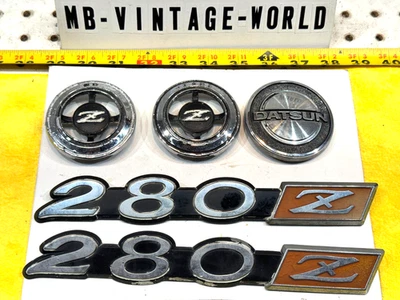 Datsun 75-78 280Z Rear hatch , side fenders front Genuine Datsun OEM 5 Emblems - Image 1 of 4