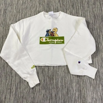 Sudadera blanca recortada Champion tejido inverso para mujer L calle Sésamo Foto 1 de 4