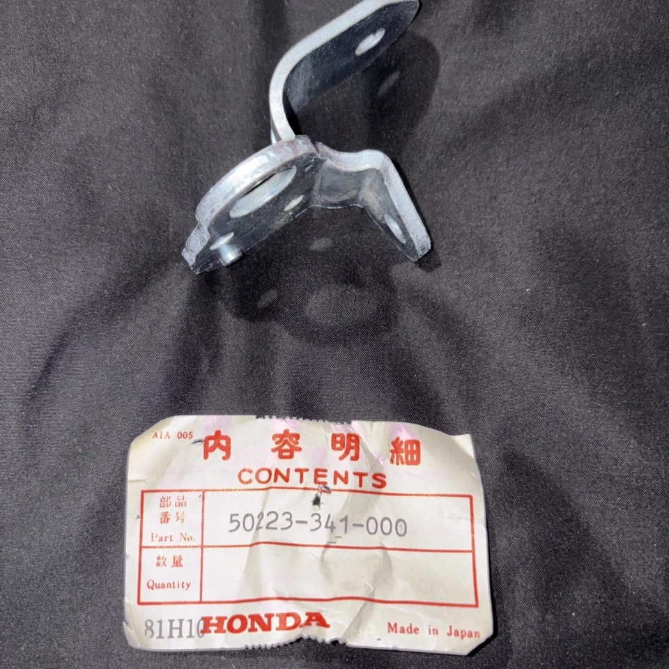 Honda CB750F SuperSport 1974 placa de ajuste de bloqueo de asiento Foto 1 de 1