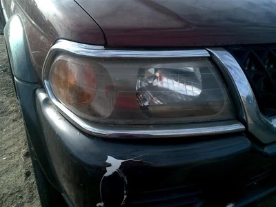 Faro derecho pasajero bisel cromado compatible con 00-04 MONTERO SPORT 376582 Foto 1 de 4