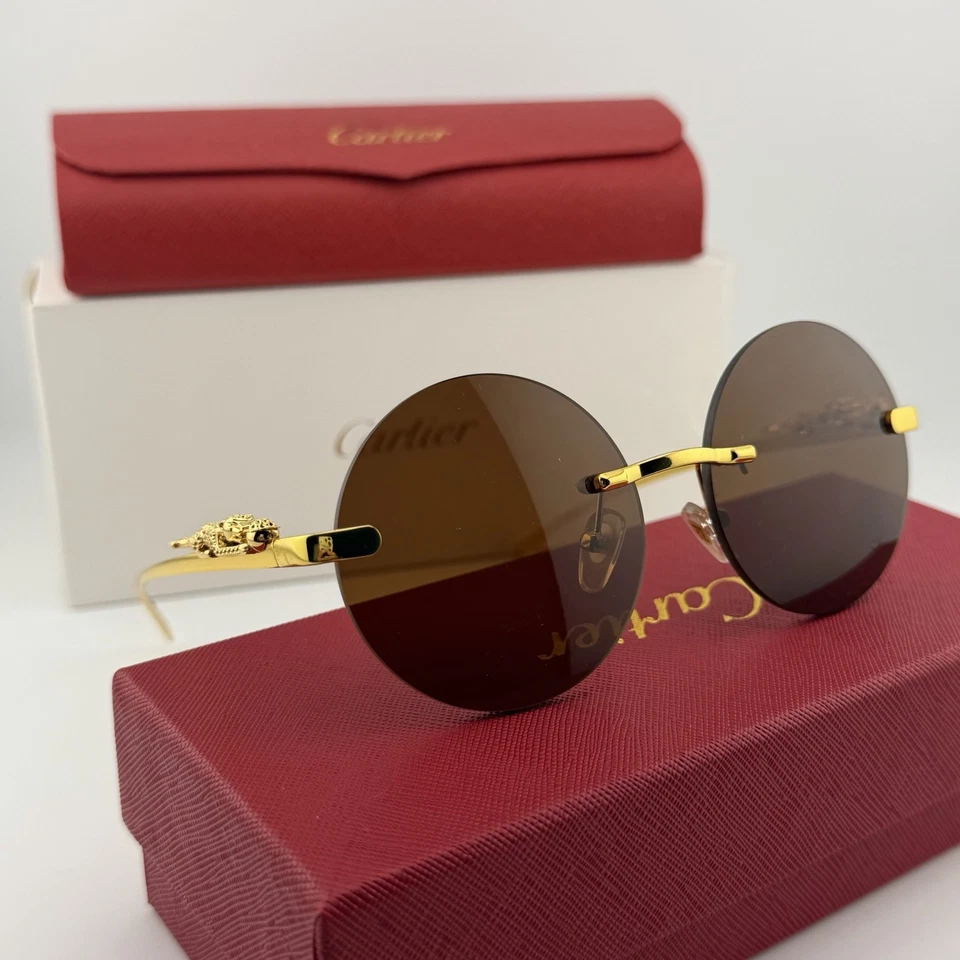 Auténticas gafas de sol Cartier sin montura redonda Panthere marco dorado lentes marrones Foto 1 de 4