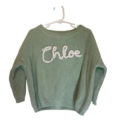 Suéter tejido verde menta Chloe para niños apliques nombre manga larga Foto 1 de 4
