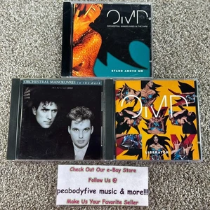 Lot O 3 ORCHESTRAL MANOEUVRES IN THE DARKS CDS - Stand, Best Of, Liberator - Bild 1 von 2