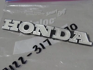 Honda OEM Left Fuel Tank Emblem 1971 CB350 87122-317-670 - Picture 1 of 7