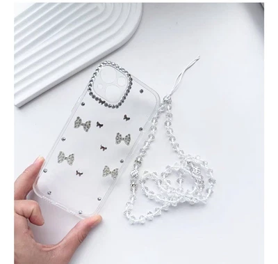 Funda Protectora con Cordón con Arco Brillo Plateado Moda iPhone 13 Nueva con Etiquetas Foto 1 de 3