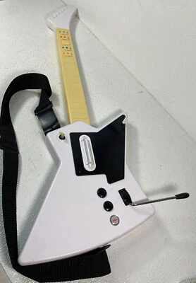 Guitarra Nyko Frontman Playstation Modelo 83057-E14 Blanca y Negra Sin Dongle con Correa Foto 1 de 4