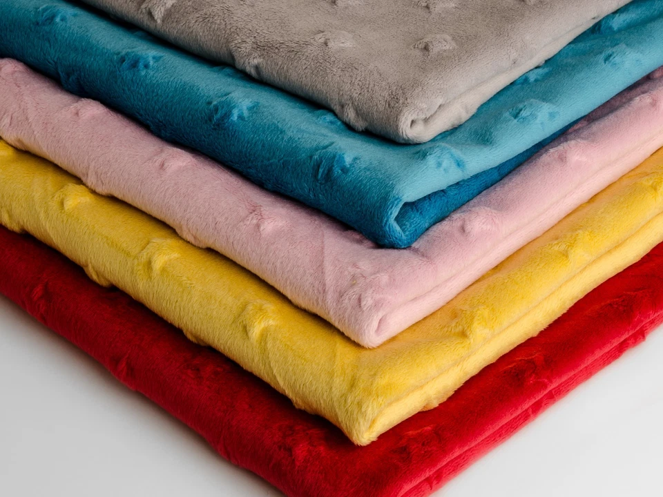 Minkee Strickstoff mit Sternprägung 50 x 155 cm - Bild 1 von 1