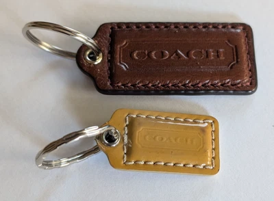 2 Pc Vintage Lot COACH LEATHER HANG TAG KEY FOB CHARM KEYCHAIN  LOGO - Image 1 of 4