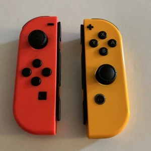 Nintendo Switch Joy-Con Coppia Controller HAC-015/HAC-016 Rosso Neon/Giallo Neon - Foto 1 di 3