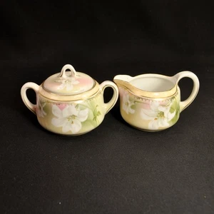 RS Germany Milchkännchen Zuckerdose mit Deckel handbemalt weiße Lilien mit Gold 1910-1945 - Bild 1 von 12