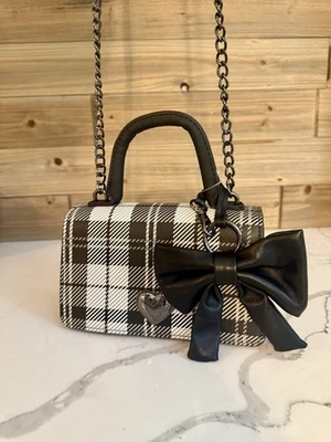 Bandolera Acordeón BETSEY JOHNSON A CUADROS CON LAZO NUEVA CON ETIQUETAS BLANCO Y NEGRO Foto 1 de 4