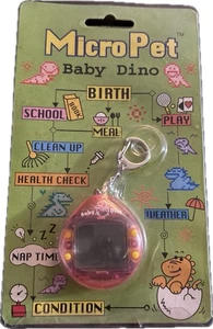 De colección 1997 Micro Virtual Tamgotchi Llavero Mascota Bebé Dino Rosa Milenio NUEVO - Imagen 1 de 5