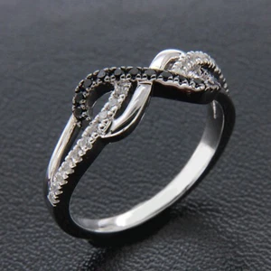 Anillo con lazo infinito de diamantes simulados de corte redondo de 0,34 quilates enchapado en oro blanco-BK de 14 k - Imagen 1 de 8