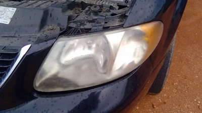 Driver Left Headlight Fits 01-07 CARAVAN 257600 - Image 1 of 4