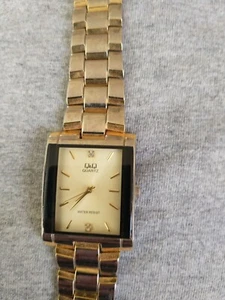 Vintage Q&Q Watch Japan Made Gold Dial Rare Quartz QQ Stainless Steel Wristwatch - Picture 1 of 2