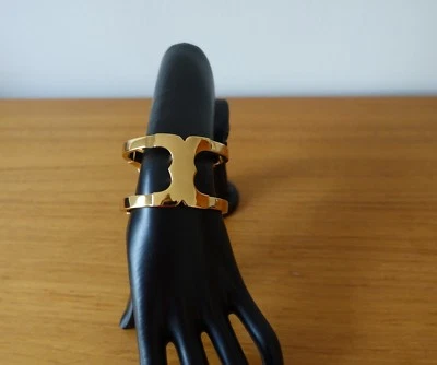 PUNHO LINK TORY BURCH GEMINI NA COR DOURADA. NOVO  - Imagem 1 de 4