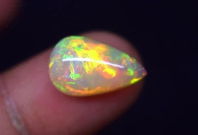 5 CT Natural Ethiopian Multi Fire Pear Opal Cabochon Gemstone 16.8x10.3 mm - Image 1 of 4