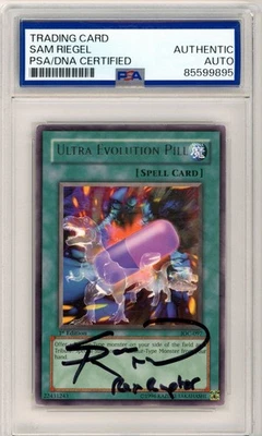 PSA Sam Riegel Signed Ultra Evolution Pill IOC-097 Invasion of Chaos Unlimited - Image 1 of 2