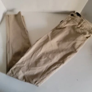 Hollister Pantalones High Rise Super Slim Caqui Beige Talla 5S W27-L28 Super Slim - Imagen 1 de 4