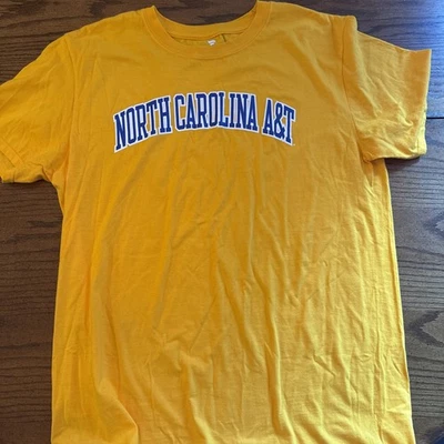 North Carolina A&T Fanatics Size XL T Shirt Yellow. - Image 1 of 4