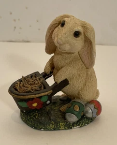 Easter Bunny Pushing A Wheelbarrow Near Easter Eggs Figurine - Picture 1 of 5