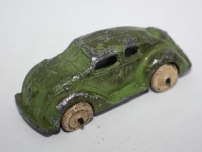 Vintage 1930s Kansas Toy and Novelty Slush Mold Sedan Green Rubber Tires No.95 - Image 1 of 4