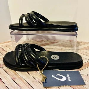 OluKai Tiare Slide Damen 7 Leder Sandalen schwarz Riemchen Strand Komfort Pool - Bild 1 von 8