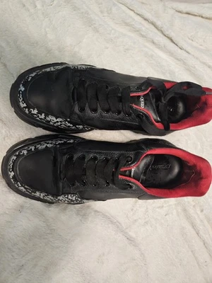 Zapatillas Alexander Mcqueen negras de gran tamaño con salpicaduras plateadas 11 Foto 1 de 4