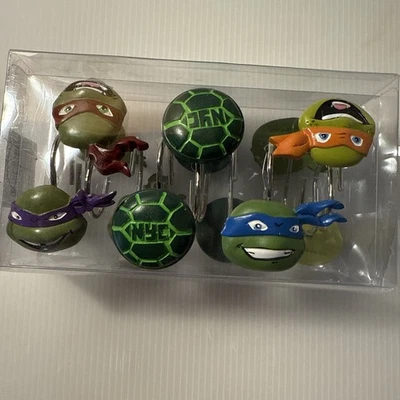 Juego de 12 ganchos para cortina de ducha Teenage Mutant Ninja Turtles nuevo en caja Foto 1 de 4