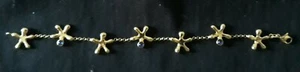 KLEINES ARMBAND GENRE PLATTE GOLD-MOTIVE STERNE 18,5 cm GEBRAUCHT SUP - Bild 1 von 4
