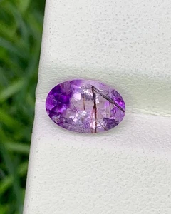 Piedra preciosa facetada natural Super Seven 1,01 quilates 8,3 x 5,5 mm forma ovalada - Imagen 1 de 7