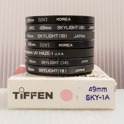 Lot of 8 Camera Lens Filter Tiffen Dietz Hoya Vivitar Skylight Haze - Image 1 of 4
