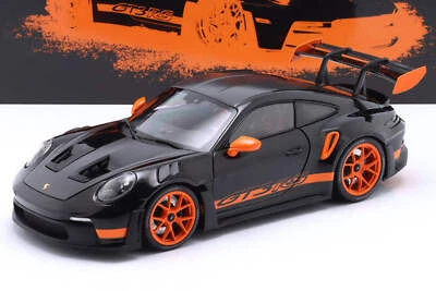 Paquete Minichamps 2022 Porsche 911 992 GT3 RS Weissach negro con ruedas naranjas y diciembre Foto 1 de 4