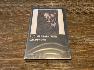 Rudimentary Peni "Cacophony" (Cassette, Sealed, 2023) - Picture 1 of 2