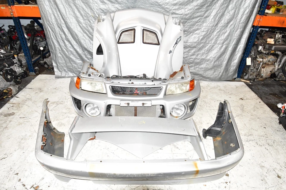 JDM 98-99 三菱 Evolution V 抽油烟机挡泥板车头灯锅炉后保险杠 — 第 1/4 张图片