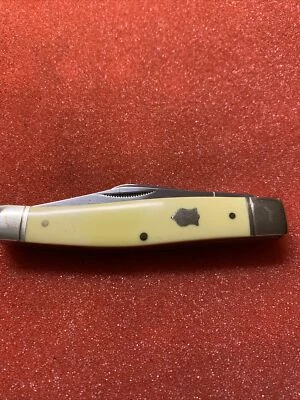 Rough Rider RR603 大号蛇形 Stockman in 440 带黄色合成保护套 — 第 1/4 张图片