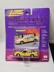 Johnny Lightning Classic Gold, 1997 Chevy Caprice Taxi 1:64 Limited Die-Cast - Picture 1 of 4