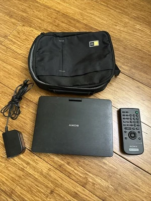 Reproductor de DVD portátil Sony DVP-FX950 9 PULGADAS pantalla giratoria con control remoto y adaptador (leer) Foto 1 de 4