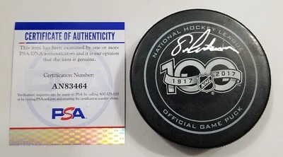 Хоккейная игровая шайба с автографом Эрика Линдроса к 100-летию НХЛ PSA 100 лет - Изображение 1 из 4