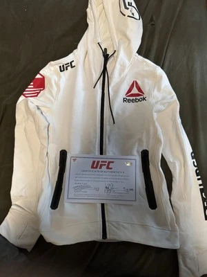 Sudadera con capucha Tatiana Suárez Fight Worn UFC Walk Out UFC 228 CERTIFICADO DE AUTENTICIDAD Foto 1 de 4